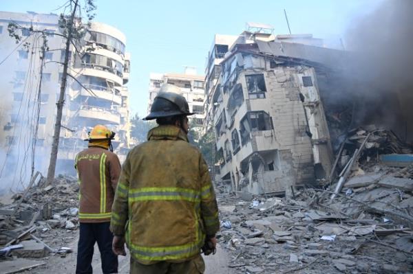 Emergency workers after an Israeli airstrike on Beirut